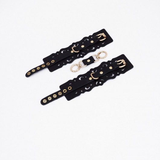 Черные кожаные наручники с узорами и золотистой фурнитурой - Crazy Handmade - купить с доставкой в Нальчике
